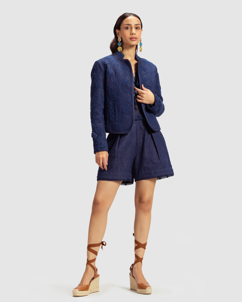 Embellished Handwoven Denim Jacket
Product DescriptionThis fitted, cropped denim jacket is adorned with floral hand embroidery and beading inspired by centuries-old folk miniature paintings. The jackJacketsEmbellished Handwoven Denim Jacket