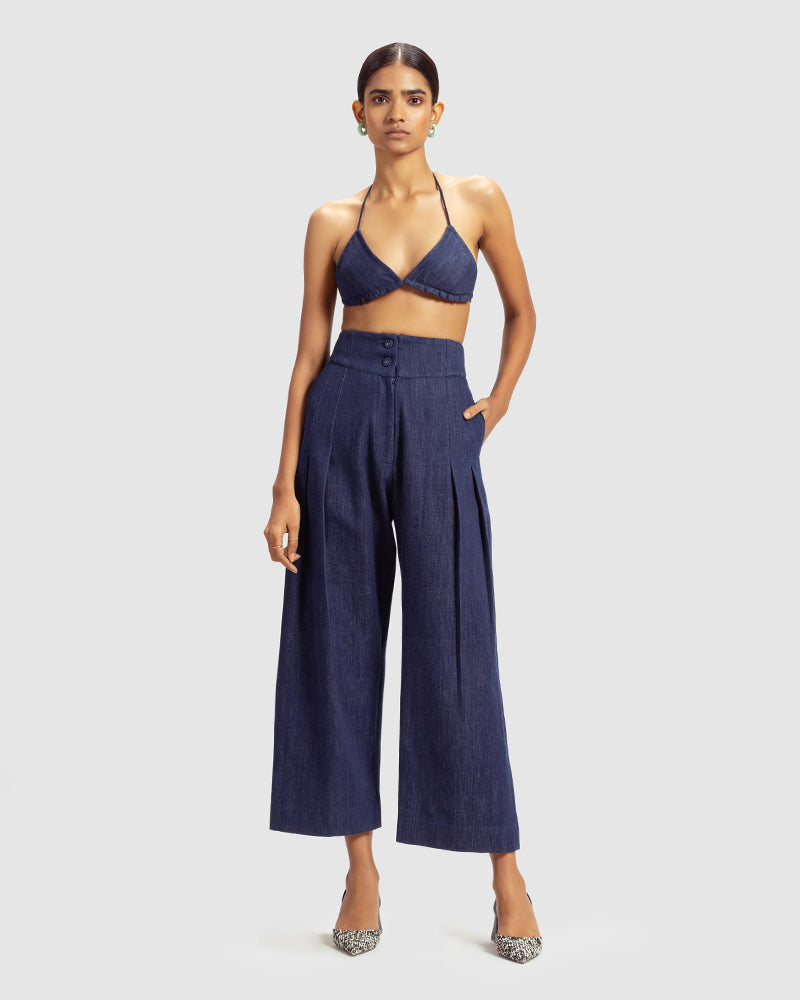 Handwoven Pleat Front PantProduct DescriptionThese handwoven denim pants come in a relaxed fit, and feature pleats, a waistband with a two-button closure, a centre-front zipper closure, and sPantsHandwoven Pleat Front Pant