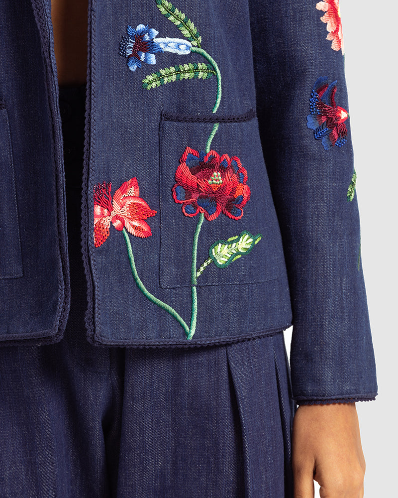 Fiori Embroidered Handwoven Denim JacketProduct DescriptionThis handwoven denim jacket is adorned with exquisite floral motifs inspired by centuries-old folk miniature paintings and crafted using hand needJacketsFiori Embroidered Handwoven Denim Jacket