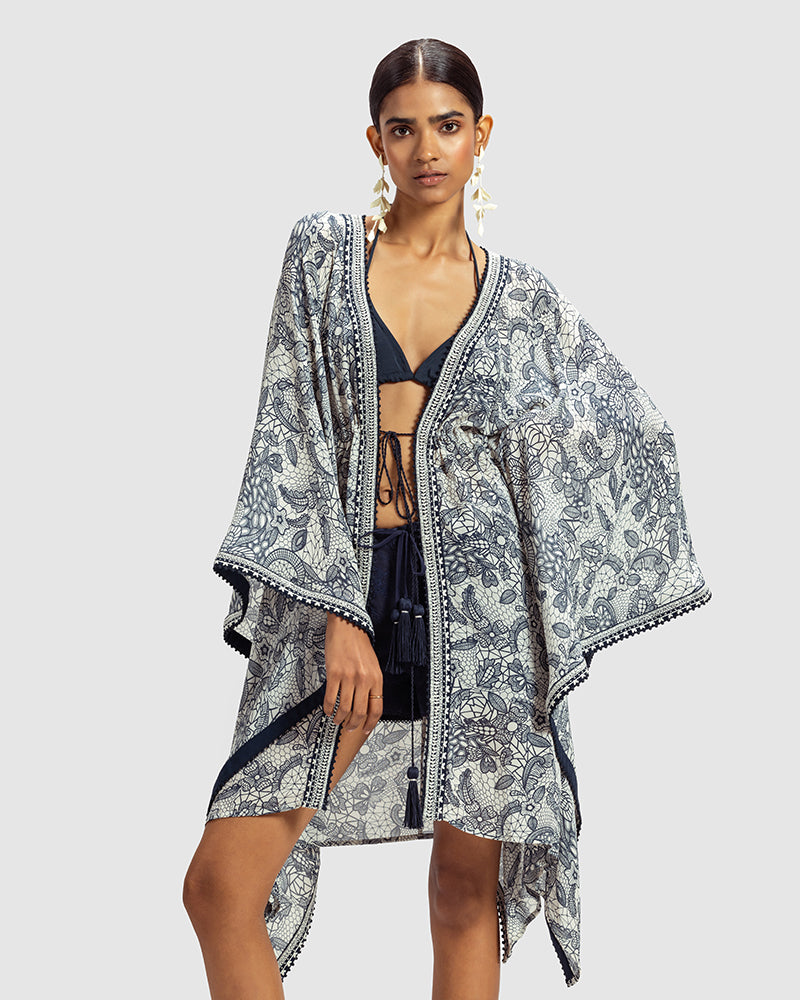 Lace Print Silk Georgette KaftanProduct DescriptionMade from silk georgette, this luxurious kaftan is enveloped in vintage French lace-inspired print. Comes in a relaxed fit, and features an open fShrugsLace Print Silk Georgette Kaftan