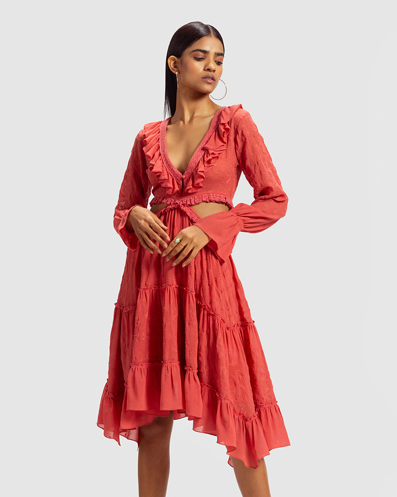 Coral Embroidered Cutout Silk Georgette DressProduct DescriptionOur silk georgette dress features a prominent cut-out waist, a ruffled neckline, and hand-guided machine embroidery inspired by floral motifs. DetDressesCoral Embroidered Cutout Silk Georgette Dress