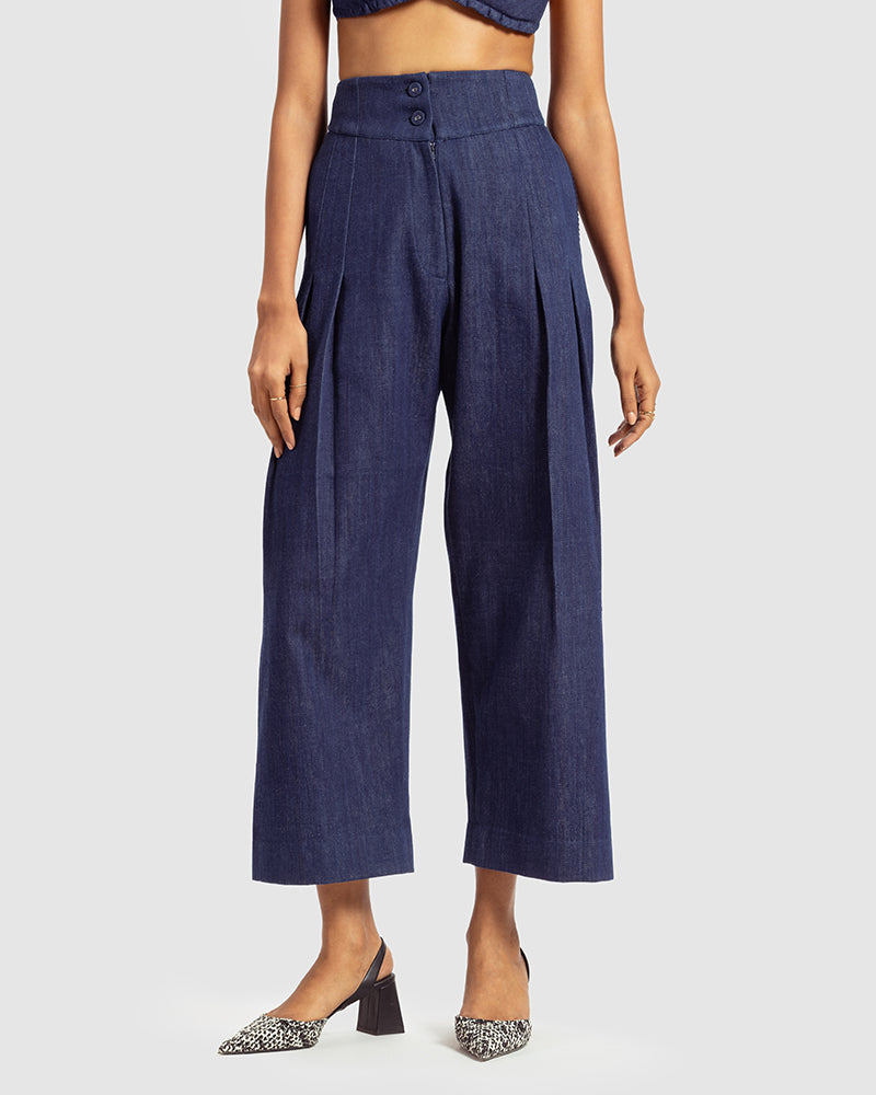 Handwoven Pleat Front PantProduct DescriptionThese handwoven denim pants come in a relaxed fit, and feature pleats, a waistband with a two-button closure, a centre-front zipper closure, and sPantsHandwoven Pleat Front Pant