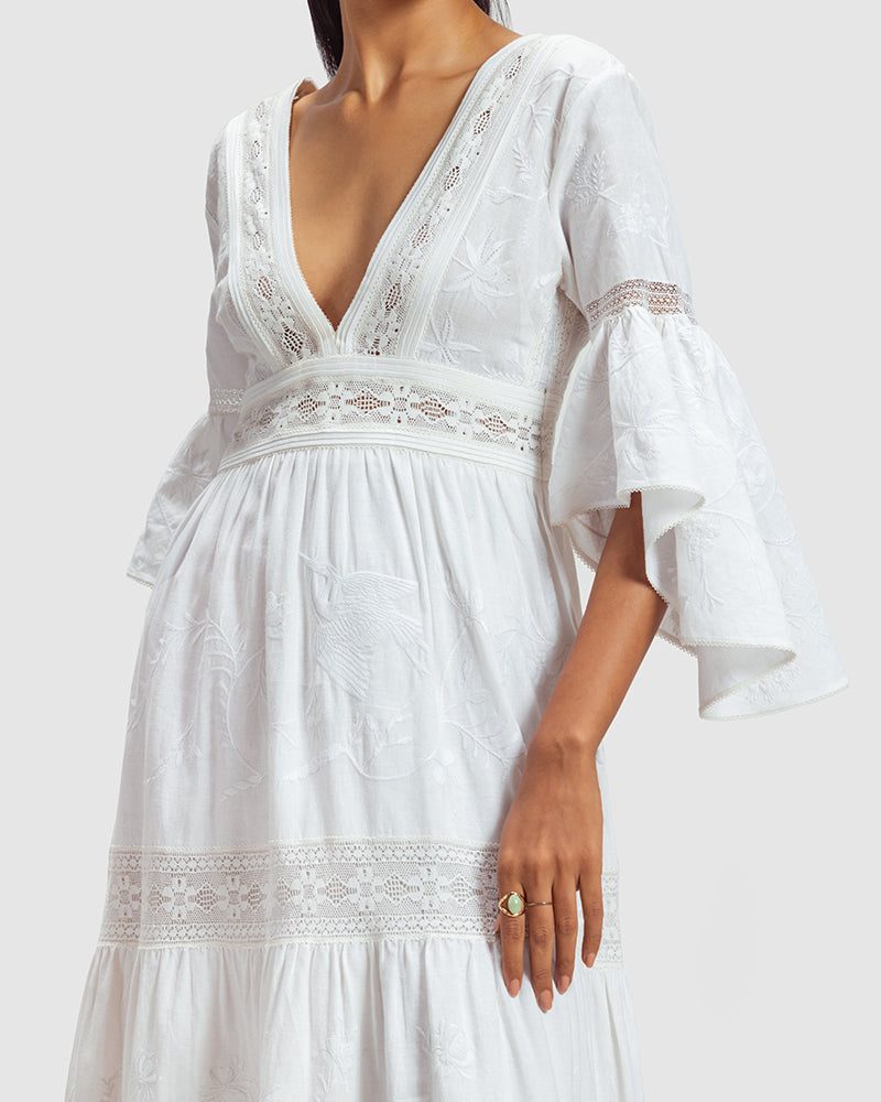 White Lace Trimmed Embroidered Linen Blend Maxi DressProduct DescriptionThis breezy linen blend dress features a mix of lace inserts and white-on-white embroidery inspired by Indian floral and fauna motifs. Also includDressesWhite Lace Trimmed Embroidered Linen Blend Maxi Dress