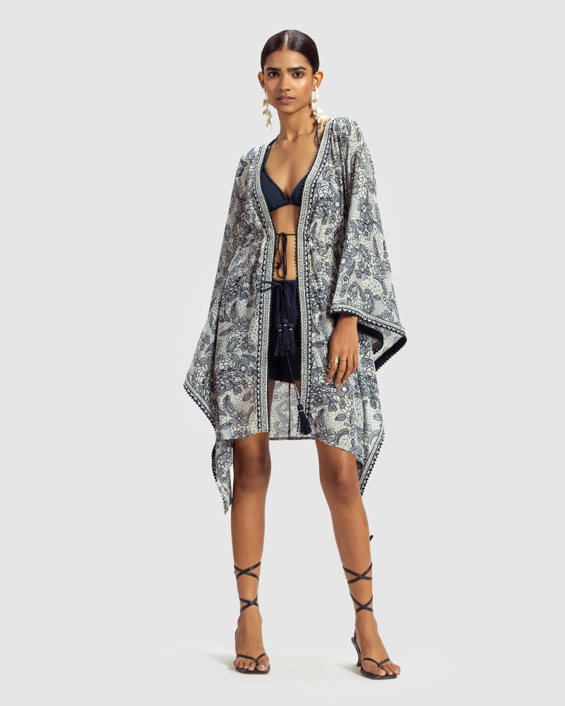 Lace Print Silk Georgette KaftanProduct DescriptionMade from silk georgette, this luxurious kaftan is enveloped in vintage French lace-inspired print. Comes in a relaxed fit, and features an open fShrugsLace Print Silk Georgette Kaftan