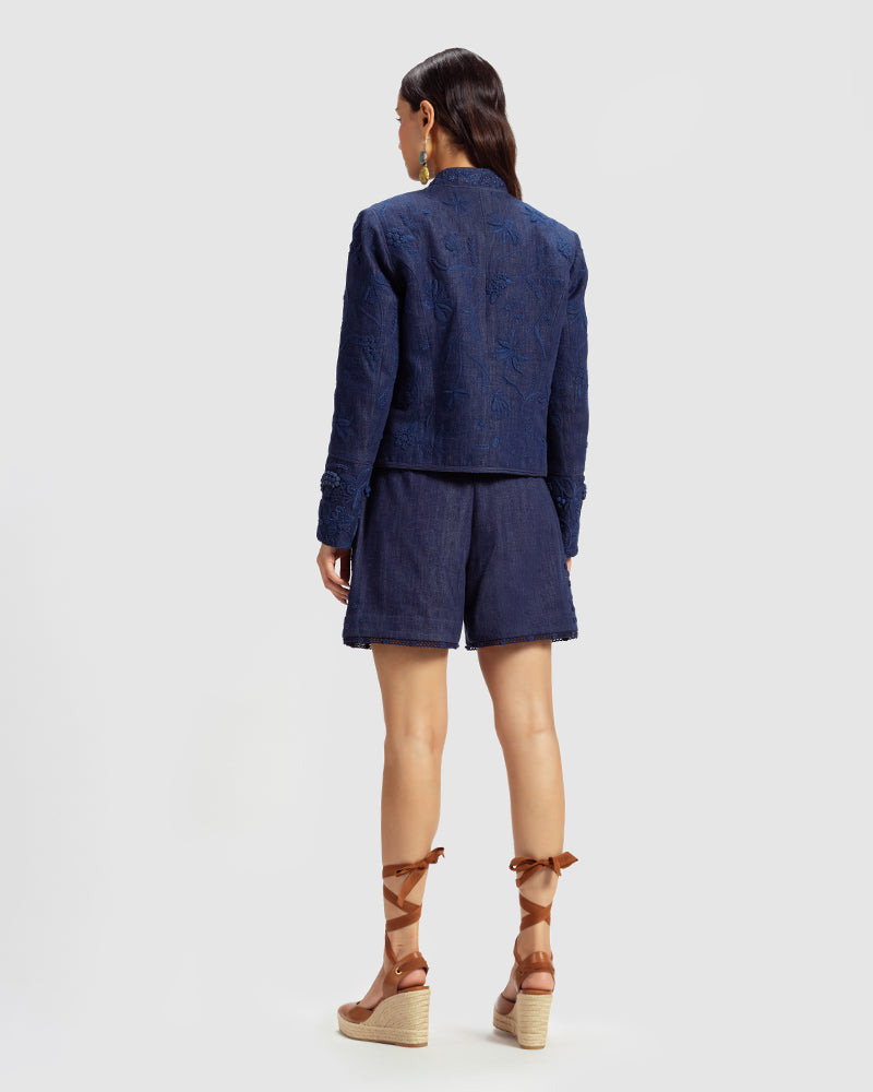 Embellished Handwoven Denim Jacket
Product DescriptionThis fitted, cropped denim jacket is adorned with floral hand embroidery and beading inspired by centuries-old folk miniature paintings. The jackJacketsEmbellished Handwoven Denim Jacket