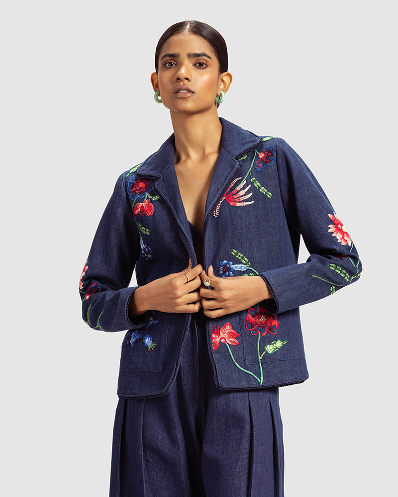 Fiori Embroidered Handwoven Denim JacketProduct DescriptionThis handwoven denim jacket is adorned with exquisite floral motifs inspired by centuries-old folk miniature paintings and crafted using hand needJacketsFiori Embroidered Handwoven Denim Jacket