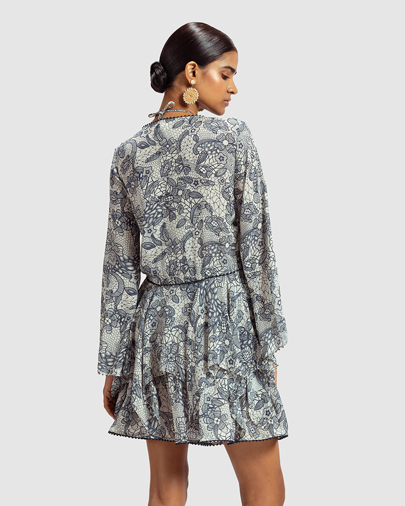 Lace Print Silk Georgette TopProduct DescriptionInspired by vintage French laces and Mughal jaali work, this silk georgette top is adorned with delicate lace print. Details include a front tie wTopsLace Print Silk Georgette Top