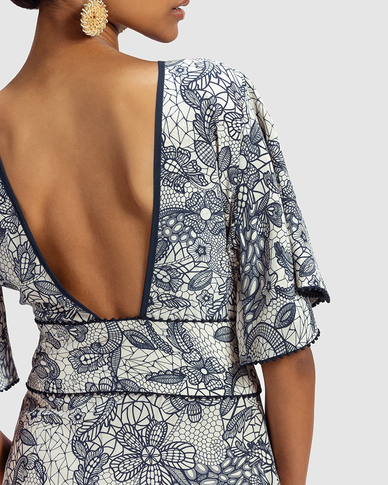 Lace Print Silk Kaya DressProduct DescriptionMade from silk crepe, this statement dress features vintage French lace-inspired print. With a relaxed fit over the shoulders, it also adds a toucDressesLace Print Silk Kaya Dress