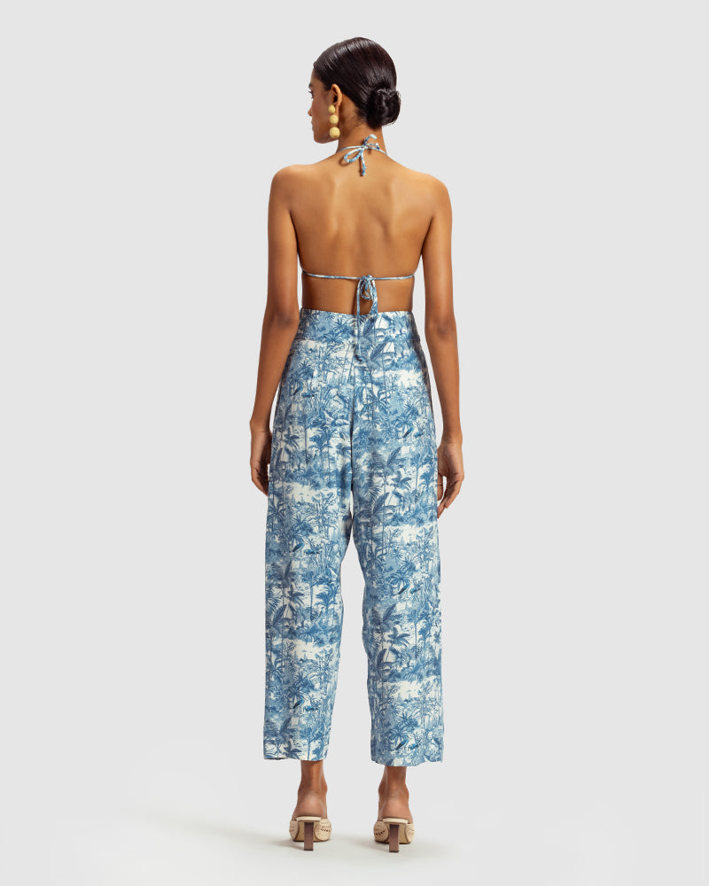 Blue Tropical Print Silk Pleated PantProduct DescriptionMade from silk satin, these high-waisted pleated pants feature our statement tropical print that reimagines Indian flora and fauna motifs with conPantsBlue Tropical Print Silk Pleated Pant