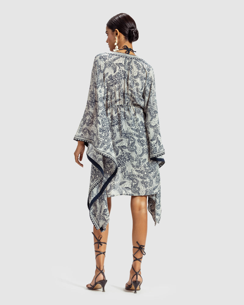 Lace Print Silk Georgette KaftanProduct DescriptionMade from silk georgette, this luxurious kaftan is enveloped in vintage French lace-inspired print. Comes in a relaxed fit, and features an open fShrugsLace Print Silk Georgette Kaftan