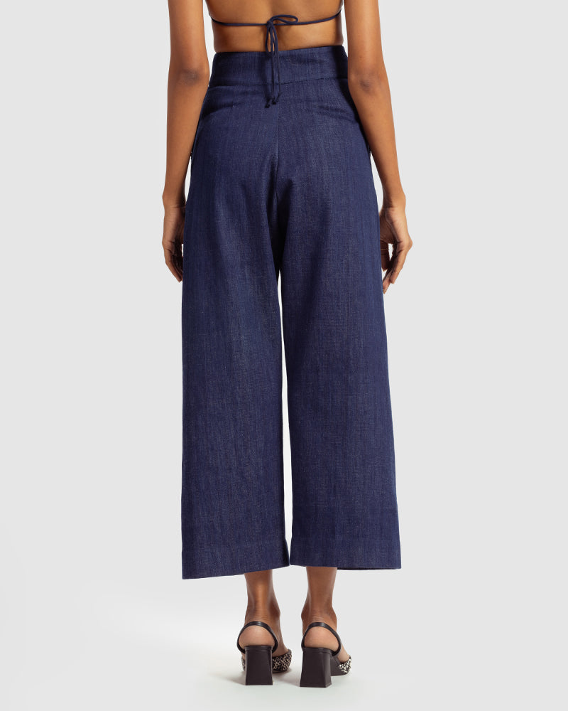 Handwoven Pleat Front PantProduct DescriptionThese handwoven denim pants come in a relaxed fit, and feature pleats, a waistband with a two-button closure, a centre-front zipper closure, and sPantsHandwoven Pleat Front Pant