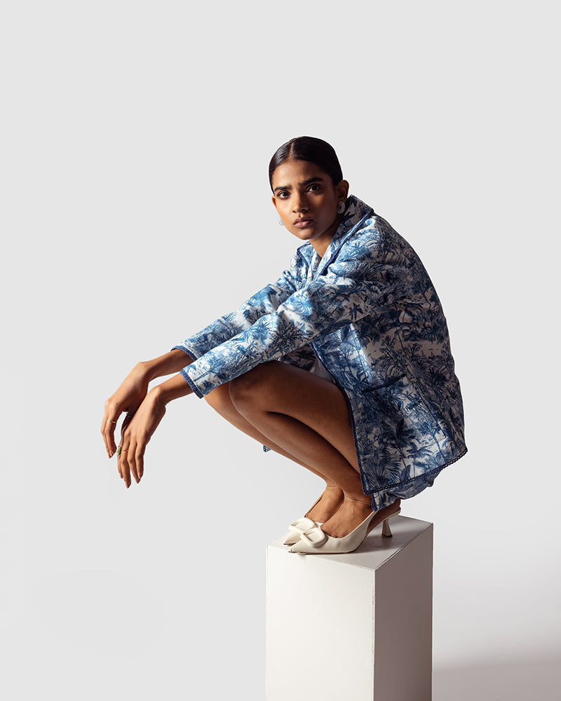 Blue Tropical Print Cotton Twill Day JacketProduct DescriptionThis awe-inspiring jacket makes a statement with our tropical print that reimagines Indian flora and fauna motifs with contemporary blue colourwayJacketsBlue Tropical Print Cotton Twill Day Jacket