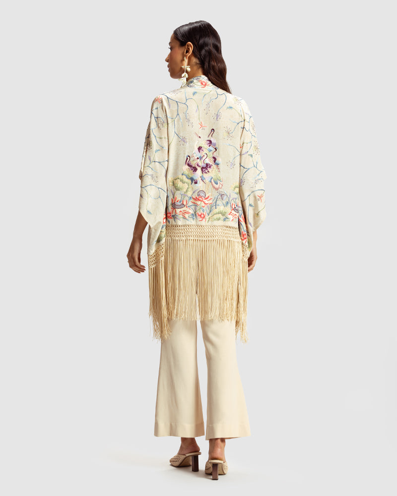 Ivory Parsi Gara Embroidered ShrugProduct DescriptionTraditionally seen on Parsi saris, this luxurious silk crepe shrug is adorned with multicoloured Parsi Gara hand embroidery. It also features a geShrugsIvory Parsi Gara Embroidered Shrug