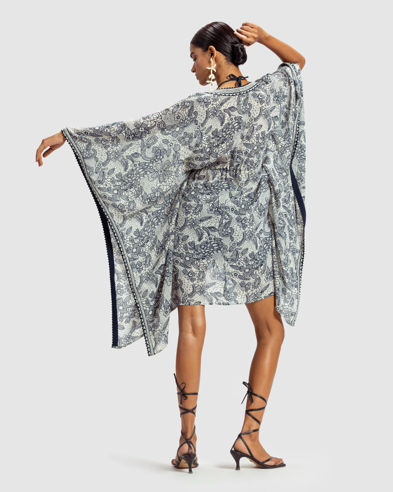 Lace Print Silk Georgette KaftanProduct DescriptionMade from silk georgette, this luxurious kaftan is enveloped in vintage French lace-inspired print. Comes in a relaxed fit, and features an open fShrugsLace Print Silk Georgette Kaftan