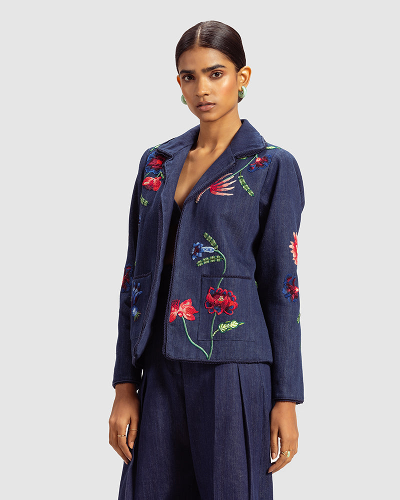 Fiori Embroidered Handwoven Denim JacketProduct DescriptionThis handwoven denim jacket is adorned with exquisite floral motifs inspired by centuries-old folk miniature paintings and crafted using hand needJacketsFiori Embroidered Handwoven Denim Jacket