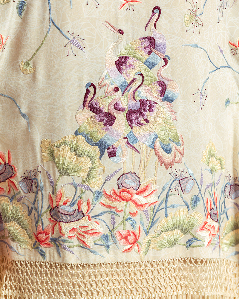 Ivory Parsi Gara Embroidered ShrugProduct DescriptionTraditionally seen on Parsi saris, this luxurious silk crepe shrug is adorned with multicoloured Parsi Gara hand embroidery. It also features a geShrugsIvory Parsi Gara Embroidered Shrug