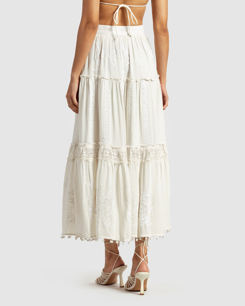 Chikankari Tiered SkirtProduct DescriptionOur tiered skirt features intricate hand chikankari embroidery with delicate jaali work and embossed white-thread stitching. The garment also inclSkirtsChikankari Tiered Skirt