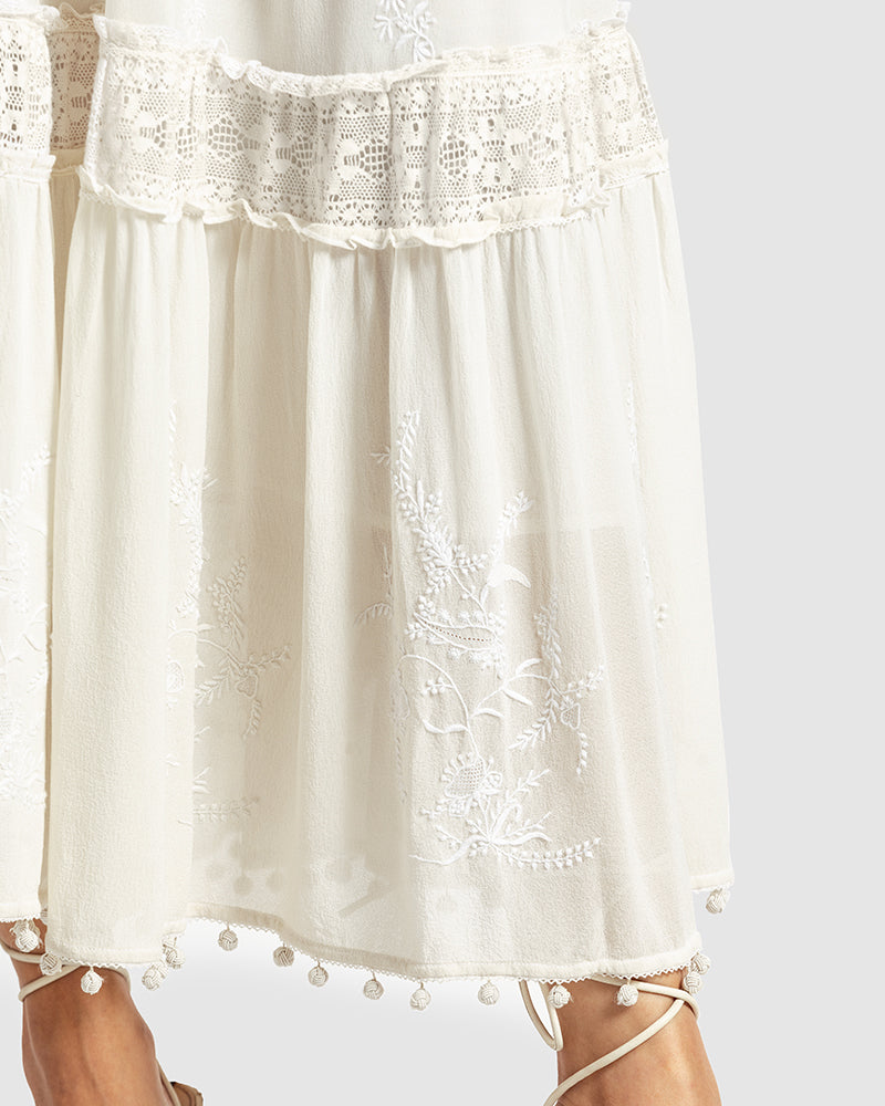Chikankari Tiered SkirtProduct DescriptionOur tiered skirt features intricate hand chikankari embroidery with delicate jaali work and embossed white-thread stitching. The garment also inclSkirtsChikankari Tiered Skirt