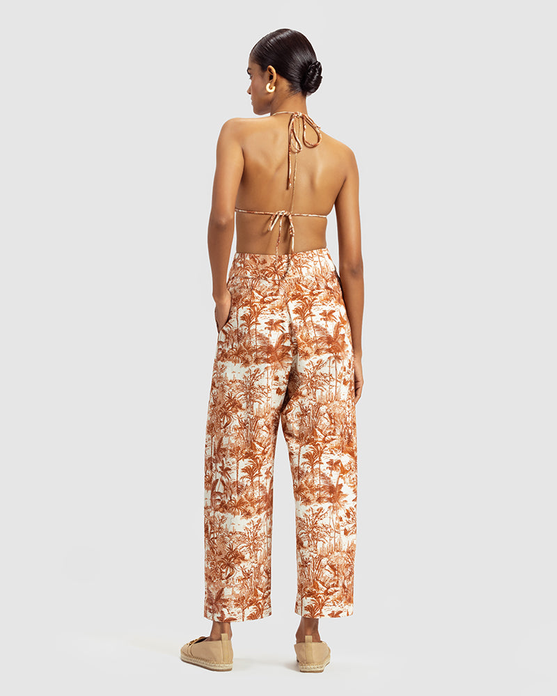 Brown Tropical Print Cotton Twill PantProduct DescriptionMade from cotton twill, these high-waisted pleated pants feature our statement tropical print that reimagines Indian flora and fauna motifs with cPantsBrown Tropical Print Cotton Twill Pant