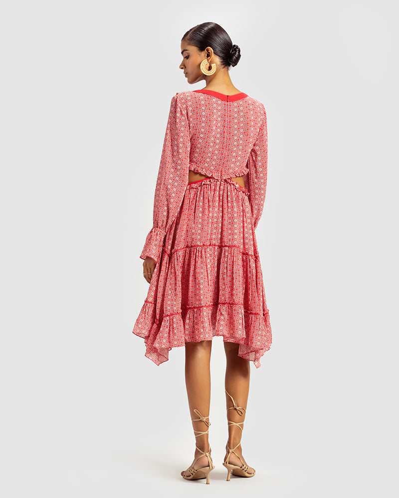 Coral Geo Print Embroidered Cutout Silk Georgette DressProduct DescriptionOur silk georgette dress makes a statement with its modern geometric motifs and a prominent cut-out waist. Details include a ruffled neckline, a cDressesCoral Geo Print Embroidered Cutout Silk Georgette Dress