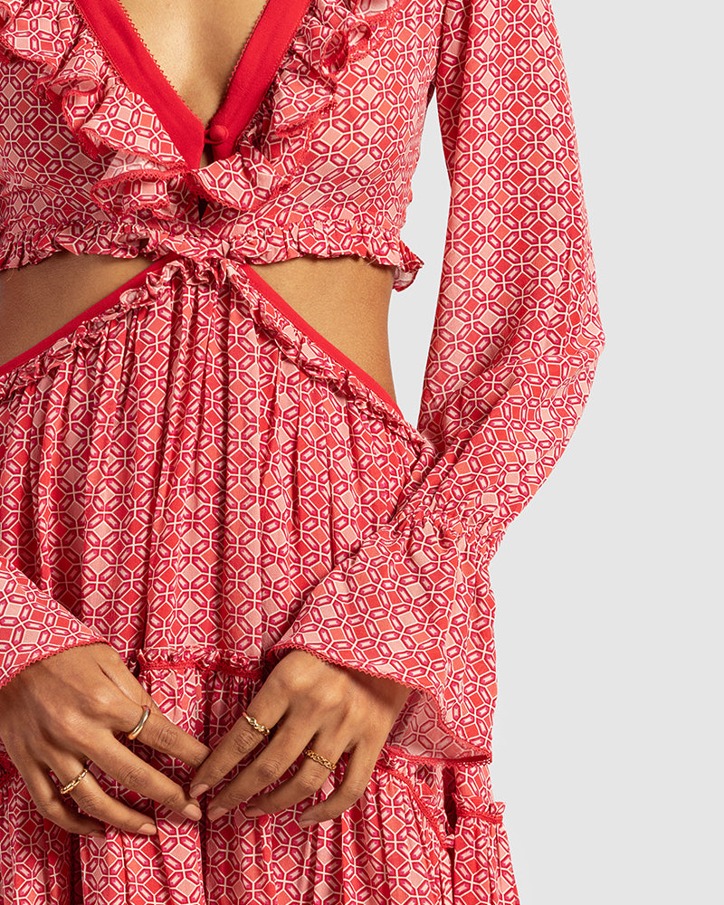 Coral Geo Print Embroidered Cutout Silk Georgette DressProduct DescriptionOur silk georgette dress makes a statement with its modern geometric motifs and a prominent cut-out waist. Details include a ruffled neckline, a cDressesCoral Geo Print Embroidered Cutout Silk Georgette Dress