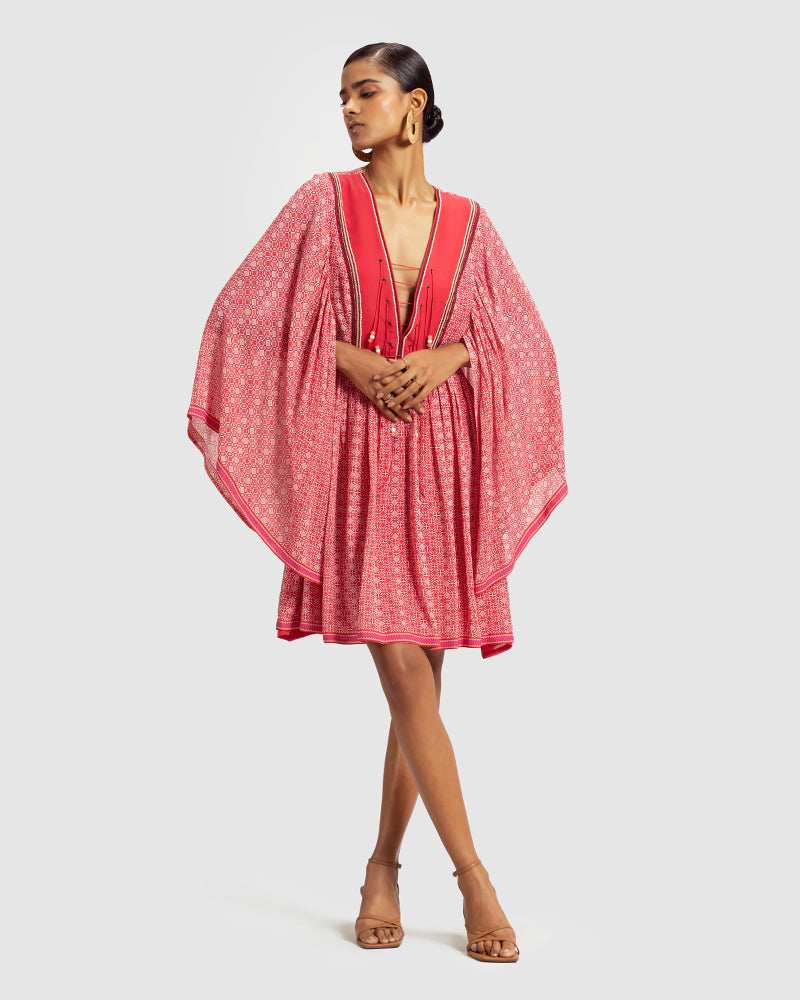 Coral Geo Print Gathered Silk DressProduct DescriptionWith print patchwork inspired by folk geometric patterns, this gathered dress is how we’ve reimagined Talitha’s signature bohemian language. Made DressesCoral Geo Print Gathered Silk Dress