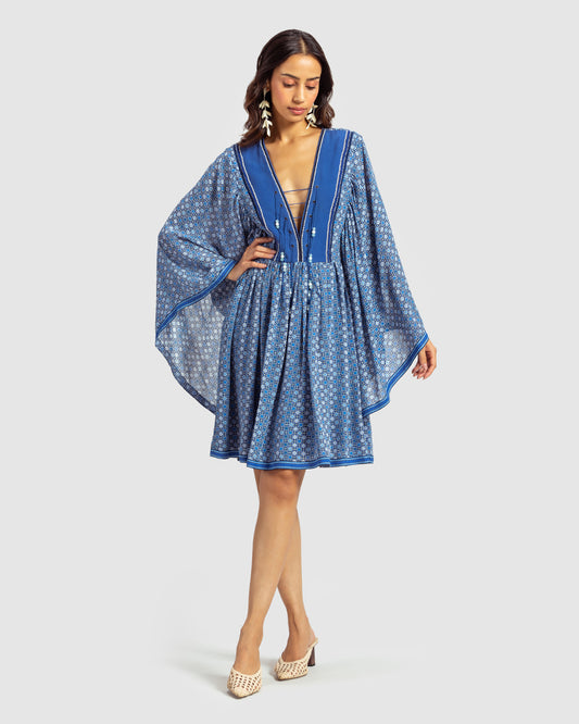 Blue Geo Print Gathered Silk DressProduct DescriptionWith print patchwork inspired by folk geometric patterns, this gathered dress is how we’ve reimagined Talitha’s signature bohemian language. Made DressesBlue Geo Print Gathered Silk Dress