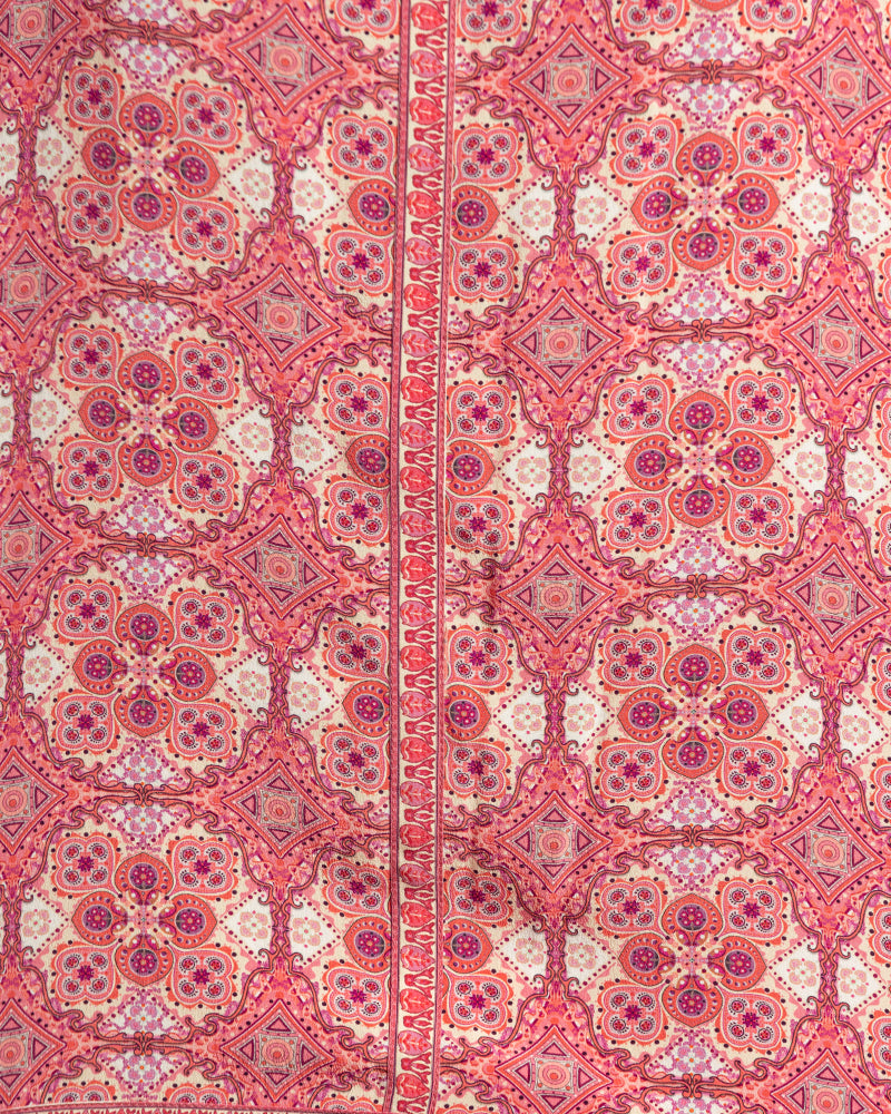 Pink Marissa Print Silk Poncho TopProduct DescriptionMade from silk crepe, this boatneck poncho top features our modern geometric print patchwork. Comes in a relaxed fit and also features bobble trimTopsPink Marissa Print Silk Poncho Top