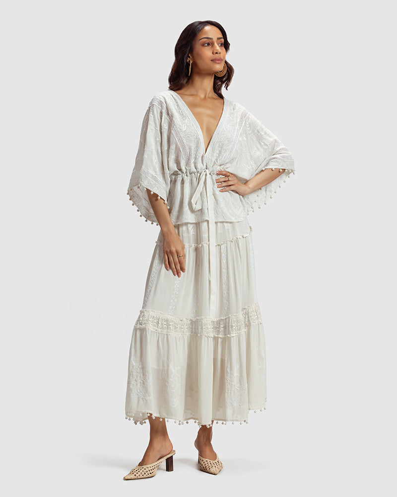 Chikankari Silk Georgette TopProduct DescriptionCreated in collaboration with Sangraha Atelier, this statement silk georgette top features delicate hand chikankari embroidery. Details include a TopsChikankari Silk Georgette Top