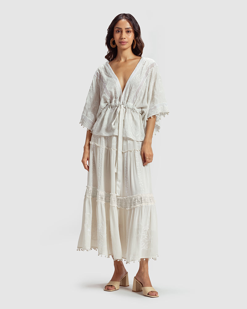 Chikankari Silk Georgette TopProduct DescriptionCreated in collaboration with Sangraha Atelier, this statement silk georgette top features delicate hand chikankari embroidery. Details include a TopsChikankari Silk Georgette Top