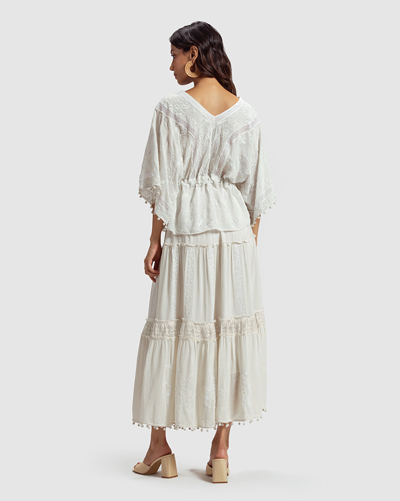 Chikankari Silk Georgette TopProduct DescriptionCreated in collaboration with Sangraha Atelier, this statement silk georgette top features delicate hand chikankari embroidery. Details include a TopsChikankari Silk Georgette Top
