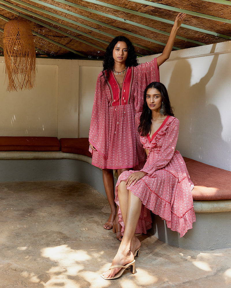 Coral Geo Print Embroidered Cutout Silk Georgette DressProduct DescriptionOur silk georgette dress makes a statement with its modern geometric motifs and a prominent cut-out waist. Details include a ruffled neckline, a cDressesCoral Geo Print Embroidered Cutout Silk Georgette Dress