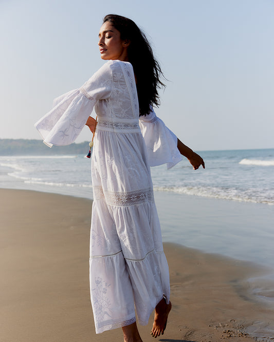 White Lace Trimmed Embroidered Linen Blend Maxi DressProduct DescriptionThis breezy linen blend dress features a mix of lace inserts and white-on-white embroidery inspired by Indian floral and fauna motifs. Also includDressesWhite Lace Trimmed Embroidered Linen Blend Maxi Dress