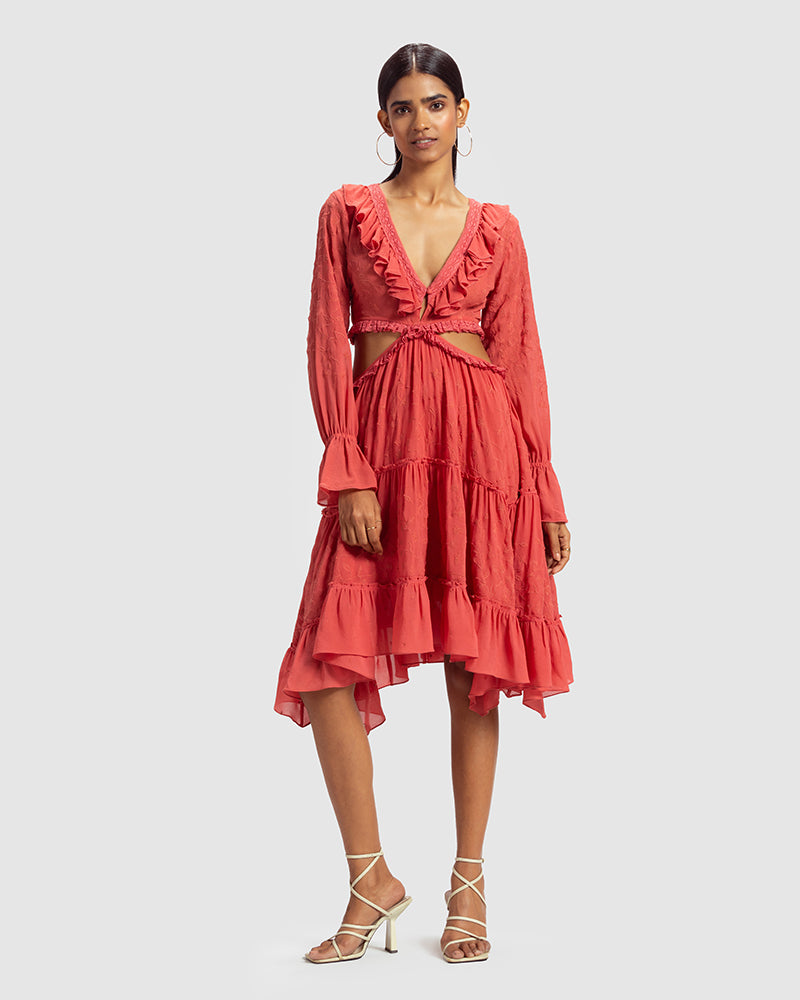 Coral Embroidered Cutout Silk Georgette DressProduct DescriptionOur silk georgette dress features a prominent cut-out waist, a ruffled neckline, and hand-guided machine embroidery inspired by floral motifs. DetDressesCoral Embroidered Cutout Silk Georgette Dress