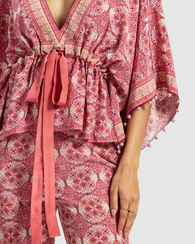 Pink Marissa Print Silk Crepe TopProduct DescriptionOur silk crepe top is a testament to our endeavour to revive Talitha’s signature bohemian language. The garment features print inspired by folk geTopsPink Marissa Print Silk Crepe Top
