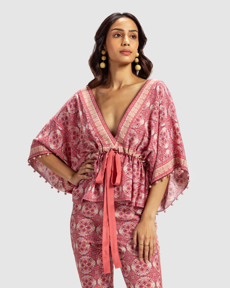 Pink Marissa Print Silk Crepe TopProduct DescriptionOur silk crepe top is a testament to our endeavour to revive Talitha’s signature bohemian language. The garment features print inspired by folk geTopsPink Marissa Print Silk Crepe Top