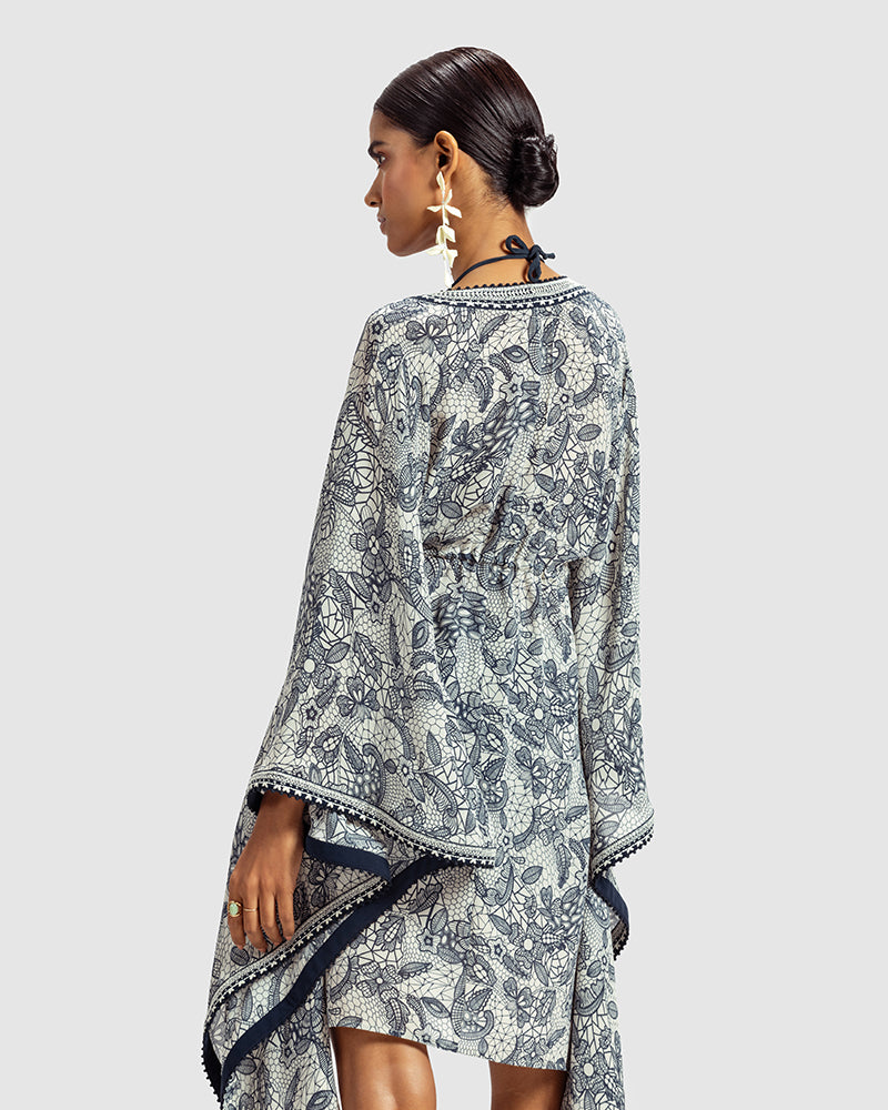 Lace Print Silk Georgette KaftanProduct DescriptionMade from silk georgette, this luxurious kaftan is enveloped in vintage French lace-inspired print. Comes in a relaxed fit, and features an open fShrugsLace Print Silk Georgette Kaftan