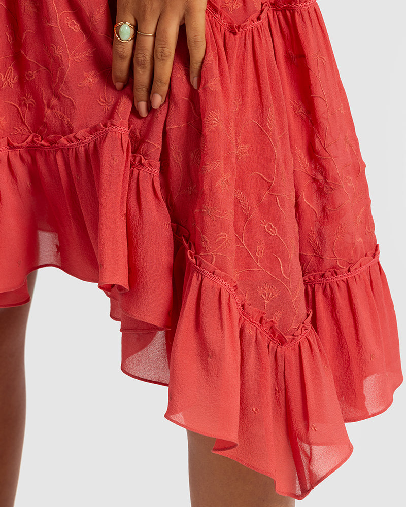 Coral Embroidered Cutout Silk Georgette DressProduct DescriptionOur silk georgette dress features a prominent cut-out waist, a ruffled neckline, and hand-guided machine embroidery inspired by floral motifs. DetDressesCoral Embroidered Cutout Silk Georgette Dress