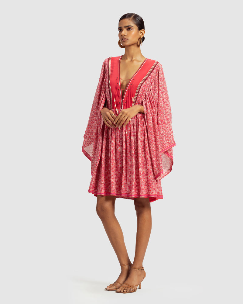 Coral Geo Print Gathered Silk DressProduct DescriptionWith print patchwork inspired by folk geometric patterns, this gathered dress is how we’ve reimagined Talitha’s signature bohemian language. Made DressesCoral Geo Print Gathered Silk Dress