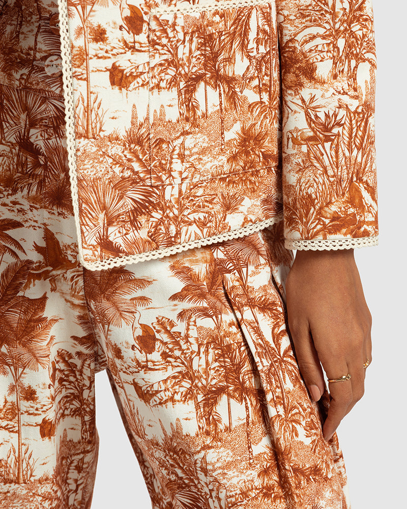 Brown  Tropical Print Cotton Twill Day JacketProduct DescriptionThis awe-inspiring jacket makes a statement with our tropical print that reimagines Indian flora and fauna motifs with contemporary blue colourwayJacketsBrown Tropical Print Cotton Twill Day Jacket